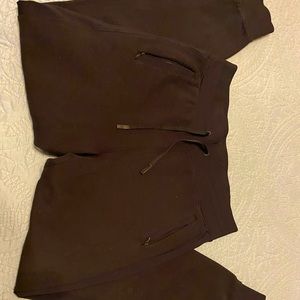 Black Lululemon joggers.